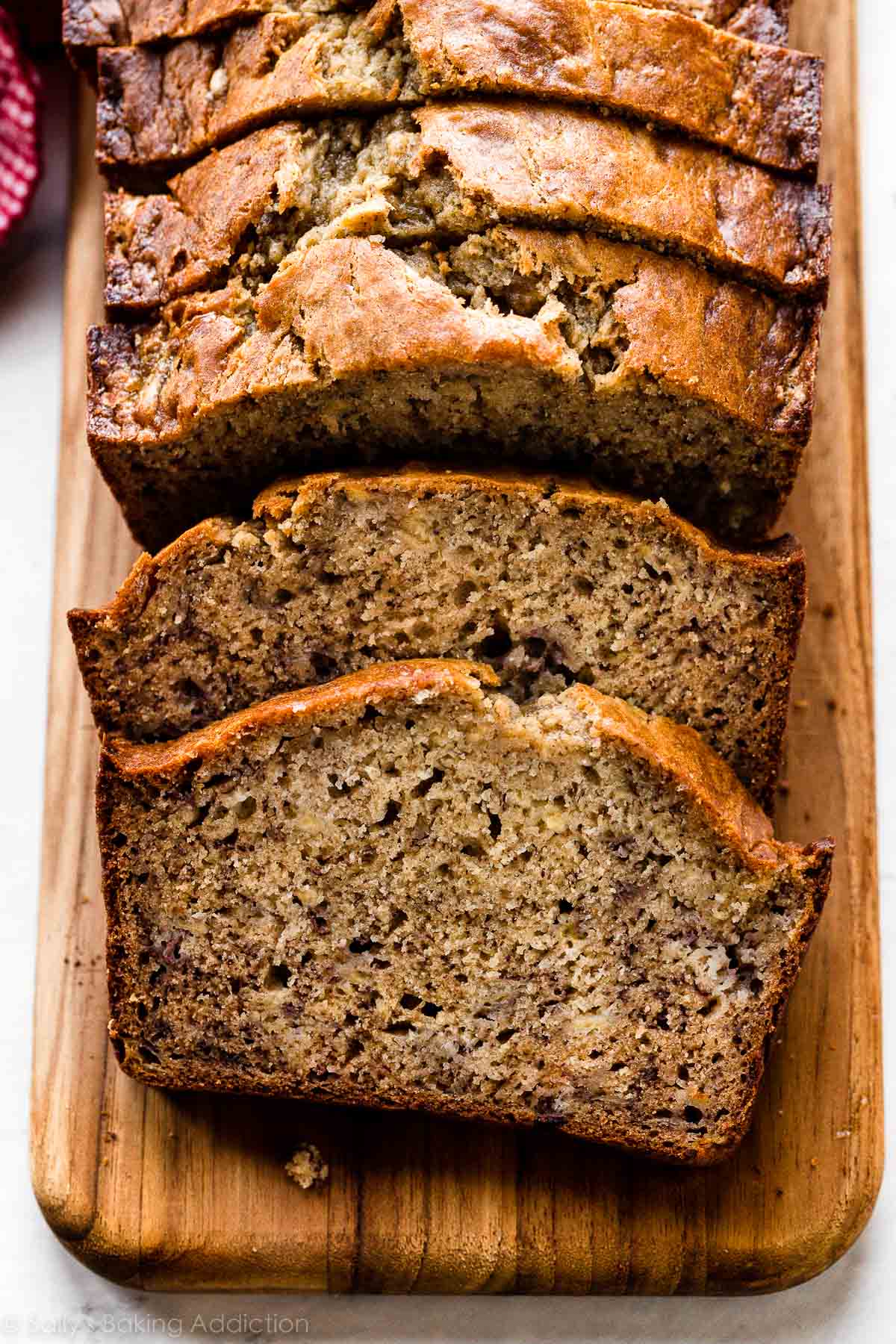 Freshly baked banana bread on a cutting board